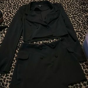 Like new cute black jacket and skort size M Blashe brand
